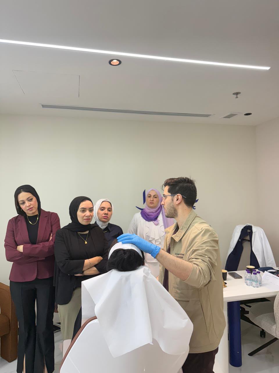 Hands-on injection training led by Dr. Asem